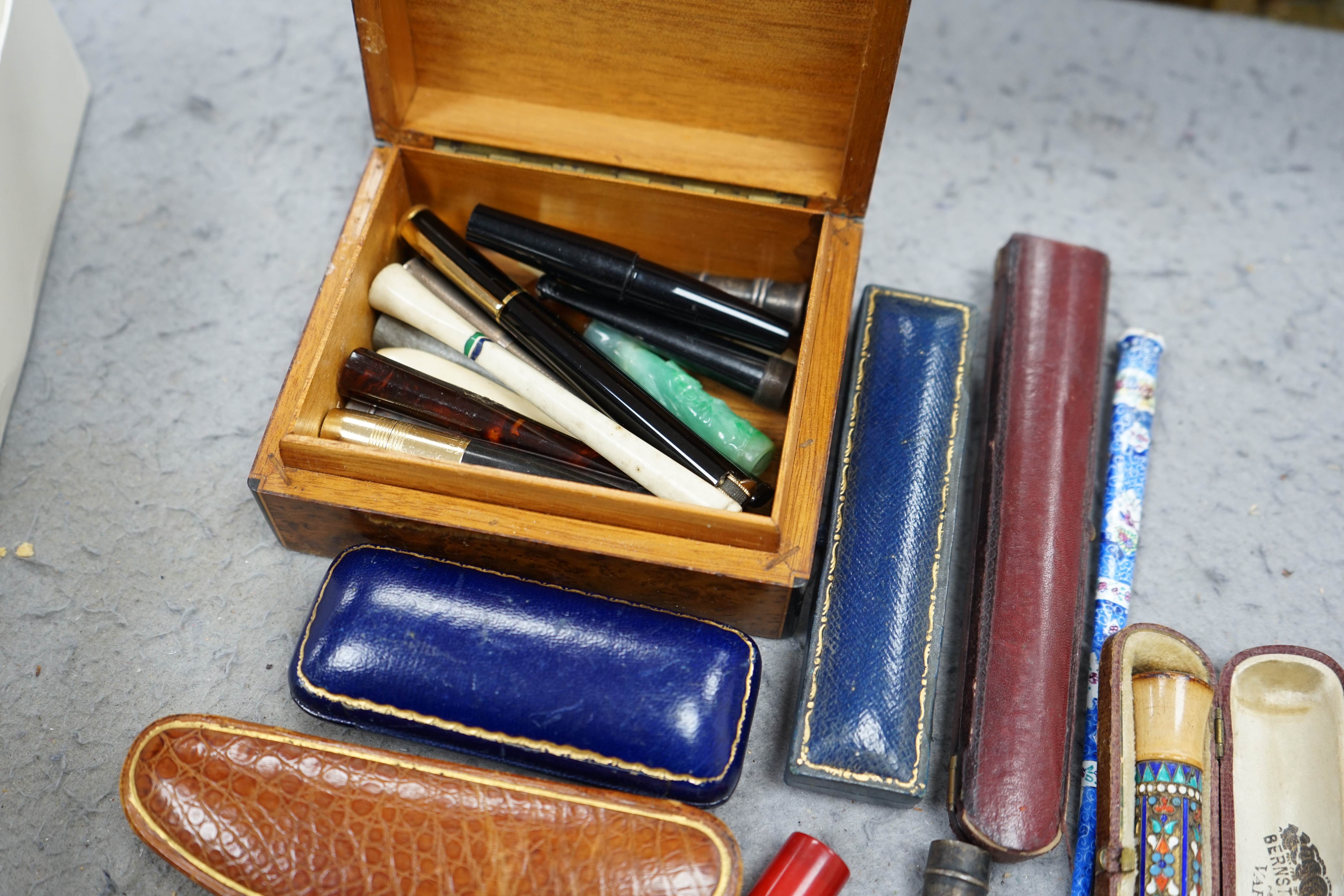 A group of assorted cigar and cheroot cigarette holders, some cased. Condition - fair